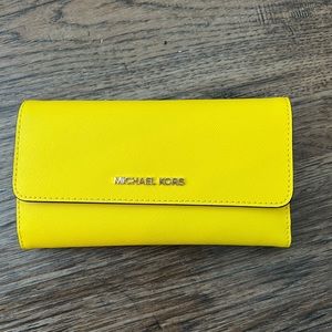 Bright yellow Michael Kors wallet